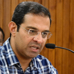 Minister Roji M John